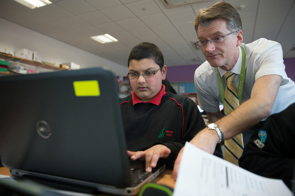 Teacher working with pupil