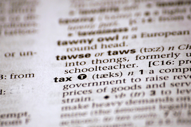 image of dictionary definition of tax