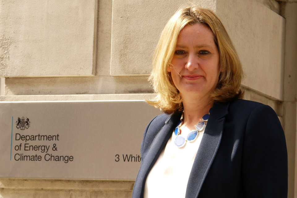 Amber Rudd in front of DECC building