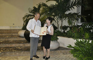 Minister Baroness Lucy Neville-Rolfe presents a copy of this historic document to Duncan Taylor, HMA.