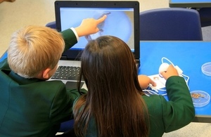 school children by computer