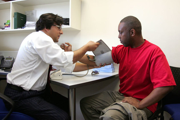 Someone having their blood pressure measured.