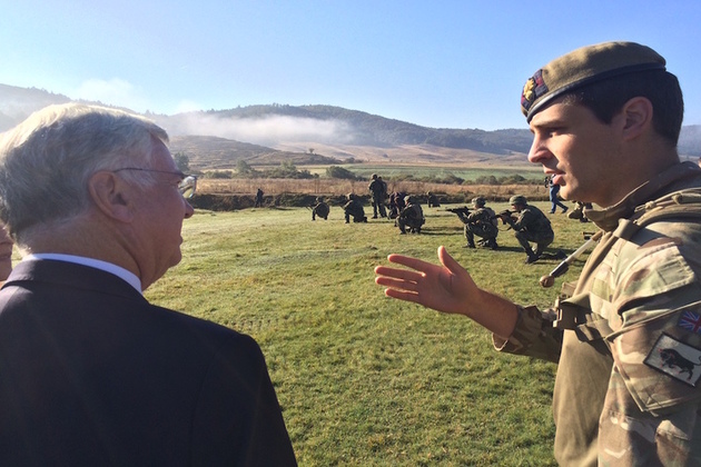 Defence Secretary Michael Fallon with Lt Edmund Harmer of 4 Platoon 2 Company Grenadier Guards at Biza training area
