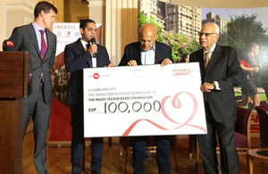 CEO of The Trifactory Ayman Hakky presents cheque to the Magdy Yacoub Heart Foundation