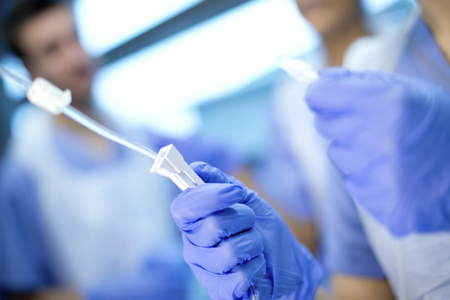 Doctors setting up an IV