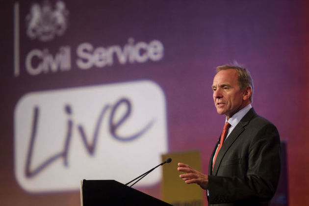 Man delivering speech at lectern