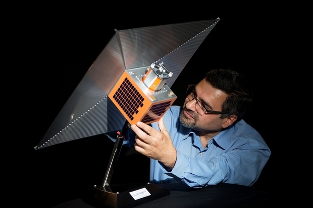 Image of a satellite with the space sail