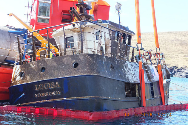 Fishing vessel Louisa being recovered from the water