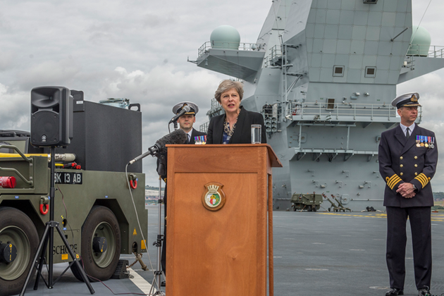 Theresa May speaking on board the HMS Queen Elizabeth