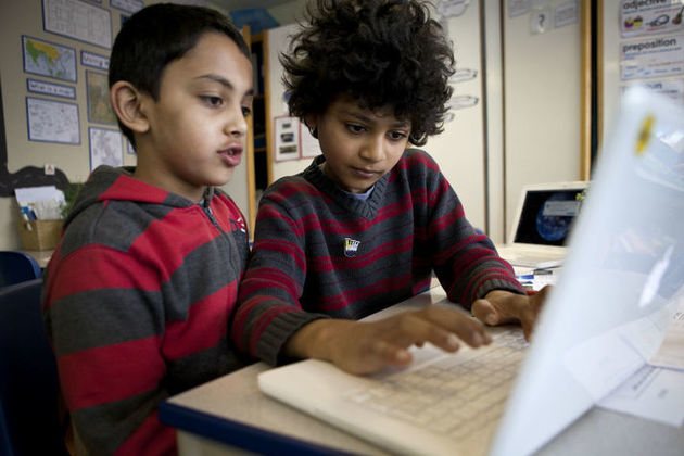 Children using a laptop