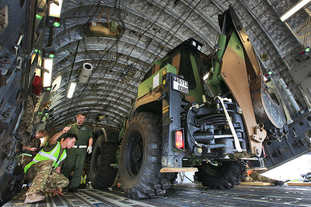 A British C-17 from 99 Squadron assists in the movement of French equipment to Guadeloupe in the Caribbean in support of French helicopter operations. Crown copyright.