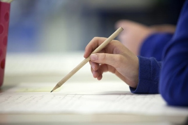 Hand with pencil