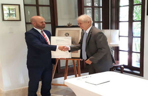 Richard Cooke, a scientist at the Smithsonian Institute, officially received the Most Excellent Order of the British Empire at the Ambassador's Residence.
