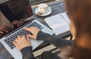 Person using laptop.