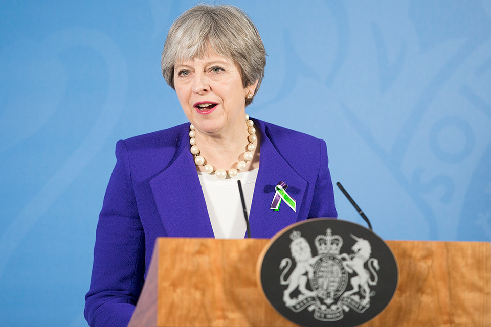 PM Theresa May speaking in Manchester.
