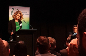 Laura Clarke presenting her speech at the NZIIA