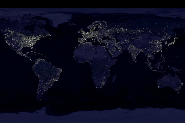 Composite image showing a global view of Earth at night, compiled from over 400 satellite images (credit: NASA/NOAA).