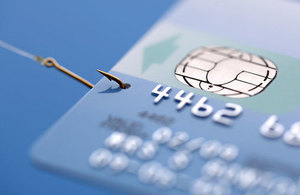 Image of credit card with fish hook