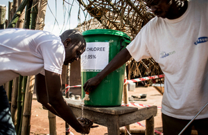 NGO workers wash their hands before entering an Ebola isolation unit and health centre during a previous outbreak of the disease in Muma, DRC on June 11, 2017. Picture: Start Network/ALIMA/JOHN WESSELS