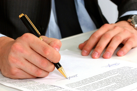 Person writing a letter