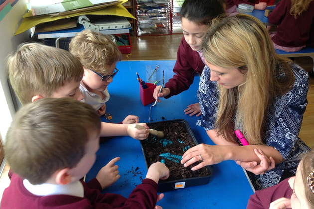 Children learning about Stonehenge archeology