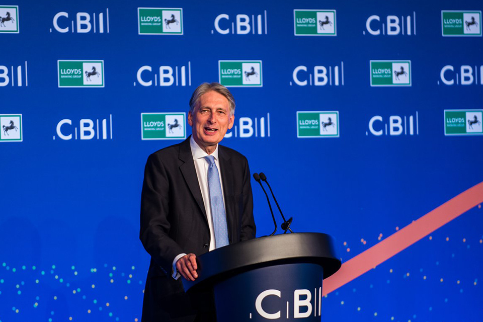 Philip Hammond at lectern.