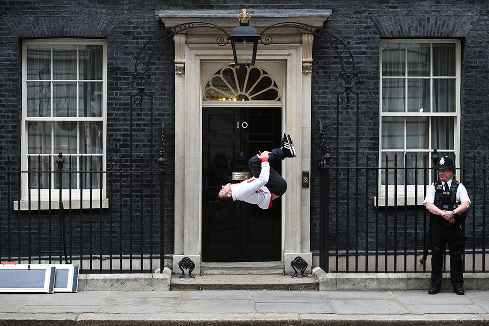 Gymnast back flips into the Commonwealth Games reception