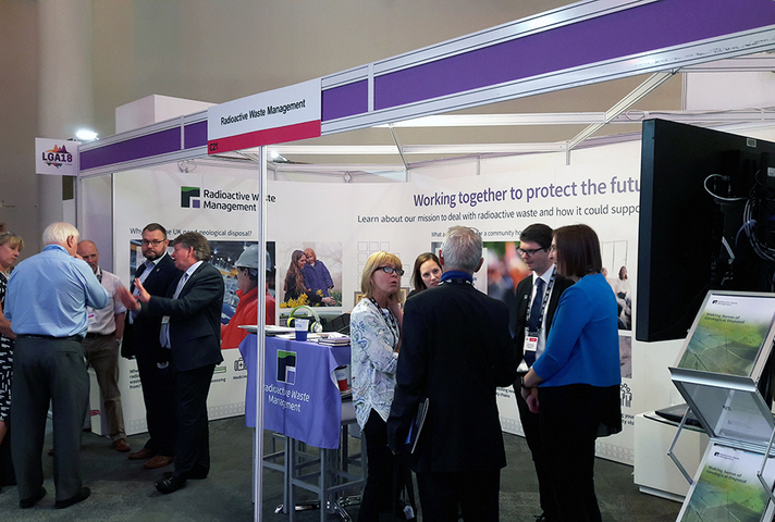 Delegates visit Radioactive Waste Management's stand at the 2018 LGA Conference