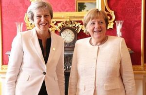 Theresa May and Angela Merkel at the Western Balkans Summit London