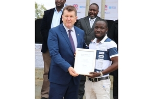 Charles receiving the award
