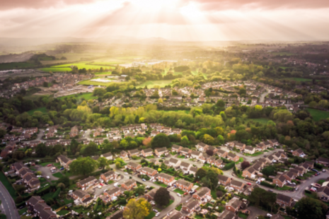 Aerial view of land and town