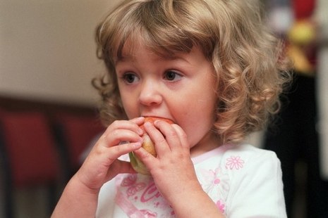 Girl eating apple