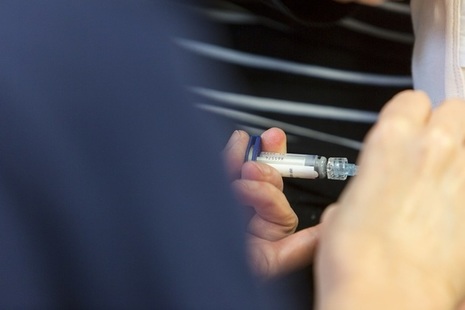 administering an injection