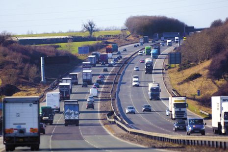 photograph of lorries driving on a motorway
