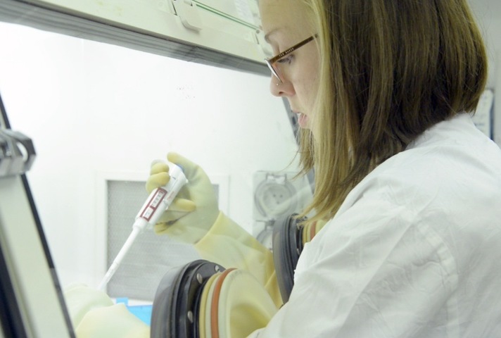 Dstl scientist in the lab
