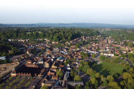 Aerial view of land and town