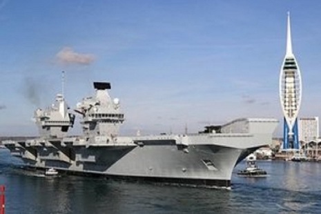 HMS Queen Elizabeth departs for the USA to land fast jets on deck for the very first time. Crown copyright.