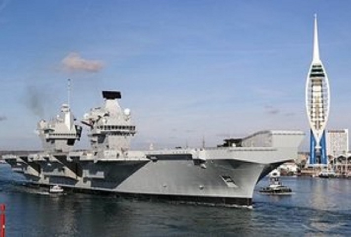 HMS Queen Elizabeth departs for the USA to land fast jets on deck for the very first time. Crown copyright.