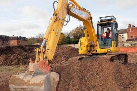 Photo of digger at building site