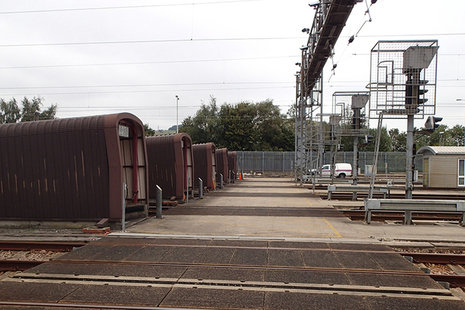 View of part of the level crossing at the west end of Dollands Moor yard looking north