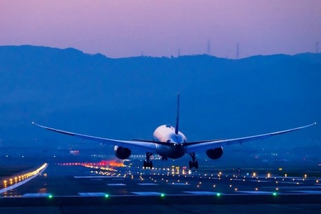 Boeing airplane lands at night