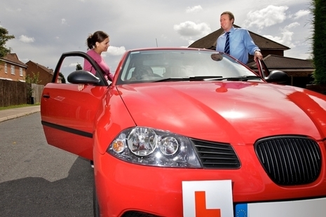 Image of a learner driver and driving instructor