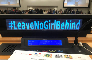 Photo of computer displaying text "#LeaveNoGirlBehind at UNGA 2018