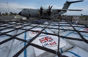 UK aid being unloaded at the international relief centre at Balikpapan. Crown copyright.