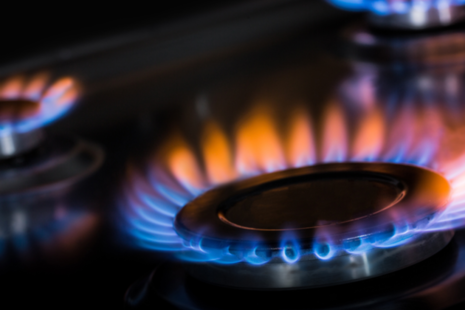 A lit flame no a gas hob.