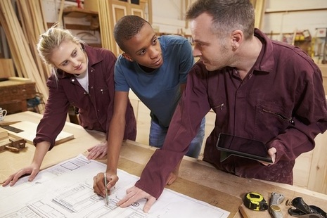 carpenter with apprentice
