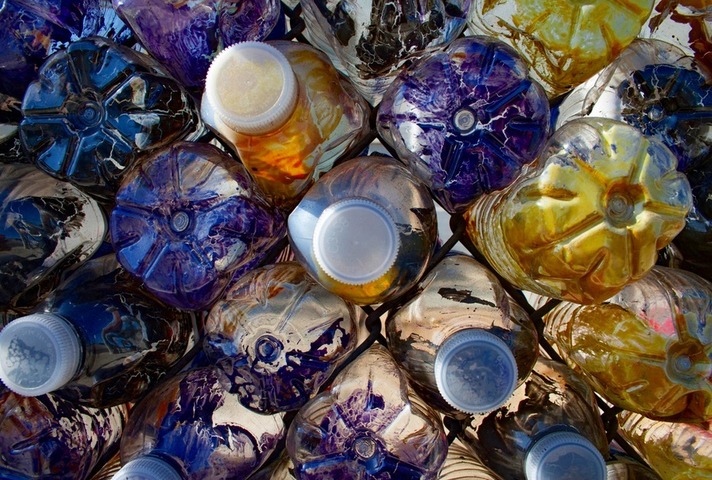 Plastic water bottles stacked up