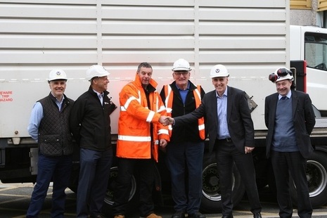 Magnox Managing Director Tony Moore shaking Adrian Owen, Wylfa Transport Manager’s, hand.
