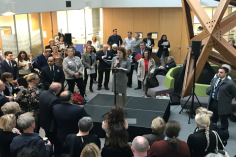 Minister talking at public event