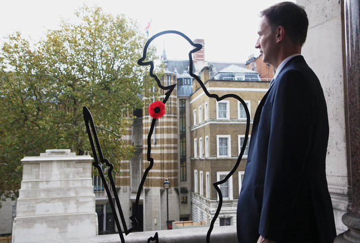 Foreign Secretary Jeremy Hunt views the There But Not There installation at the Foreign & Commonwealth Office